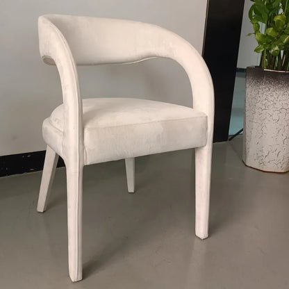 A Nordic minimalist modern designer shaped armchair living room dining room dining chair