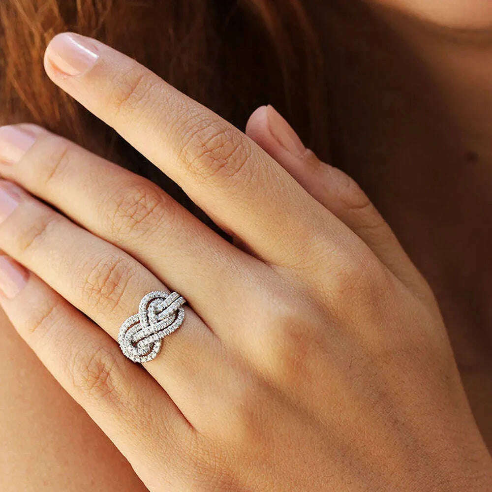 Huitan 2023 New Woman Ring Twist Infinite Shape Crystal Cubic Zirconia Rings Exquisite Female Wedding Bands Fashion Jewelry Bulk